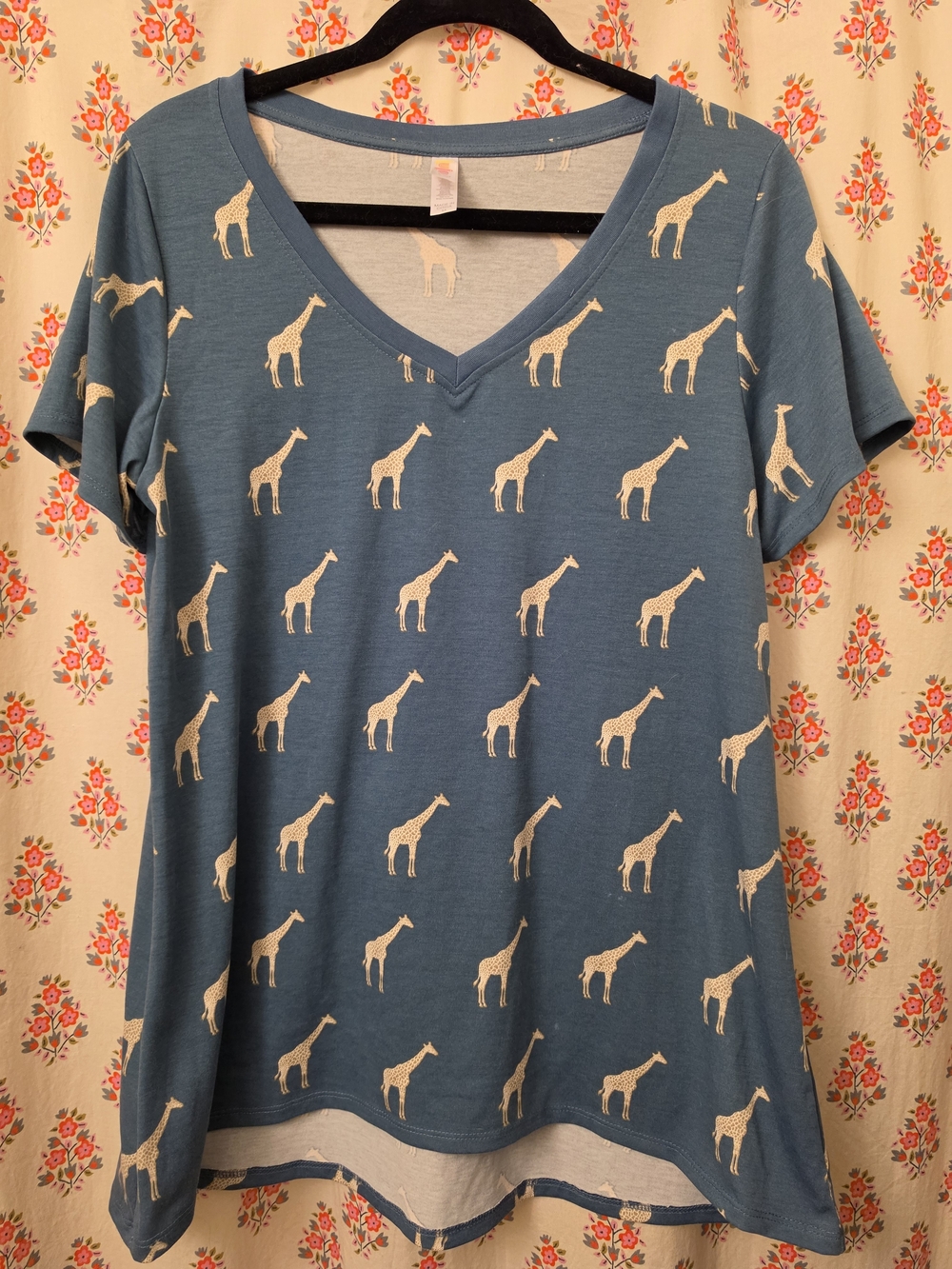 LuLaRoe Blue V-Neck Tee with Cream Giraffe Print